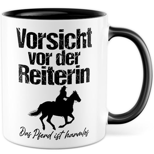 Reiterin Tasse mit Spruch - Geschenk Vorsicht vor der Reiterin Das Pferd ist harmlos - Kaffeetasse aus Keramik 330ml - Pferdemädchen Reiterin Pferd Stall Dressur Springreiten Reitclub Kaffee-Becher